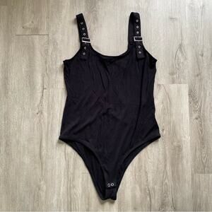 Torrid Black Ribbed Bodysuit with Buckle Detail 1X